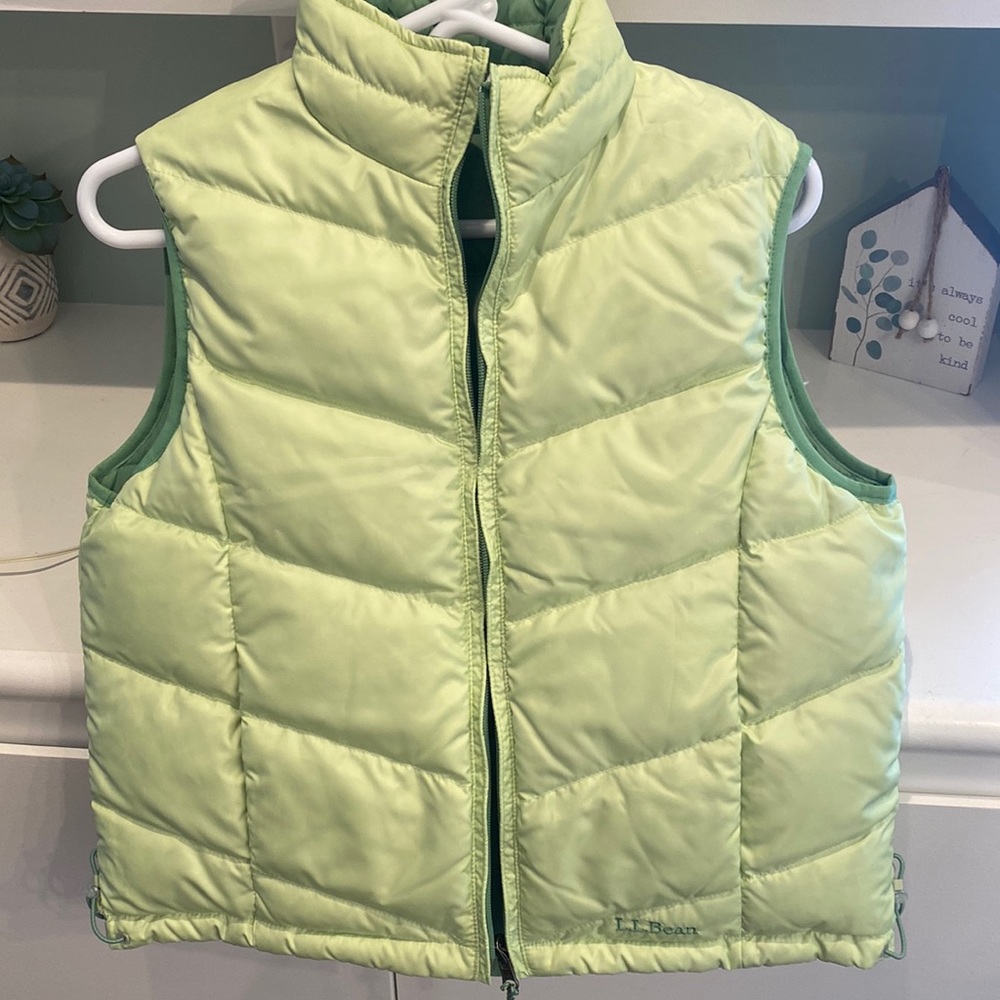 Down puffer reversible vest. New condition barely worn. No stains, nonsmoking.